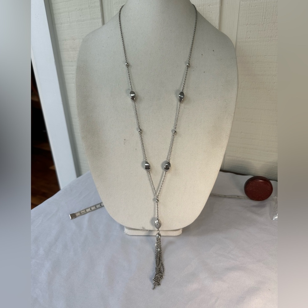 Long silvertone tassel necklace